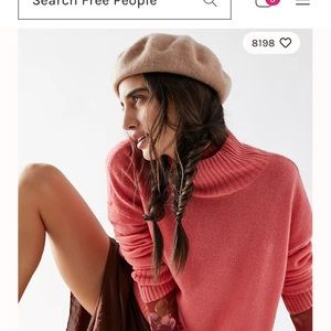 Free people cashmere sweater in the color geranium. Size M
